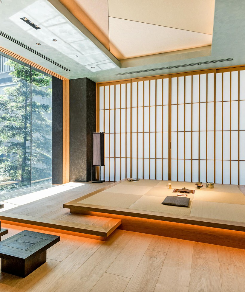 A sunlit Japanese interior overlooking a garden